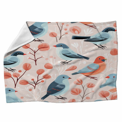 Jeté d'oiseau en jeté bleu
