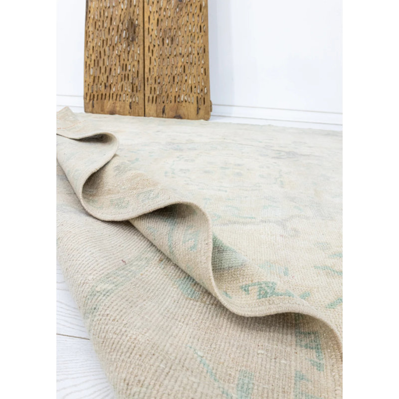 Tapis crème oriental en laine rétro