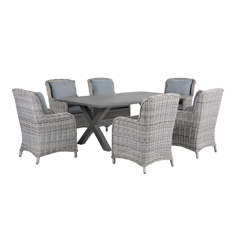 Dibella 6 - Person Wicker Patio Dining Set with Rectangular Table , Cushions Included