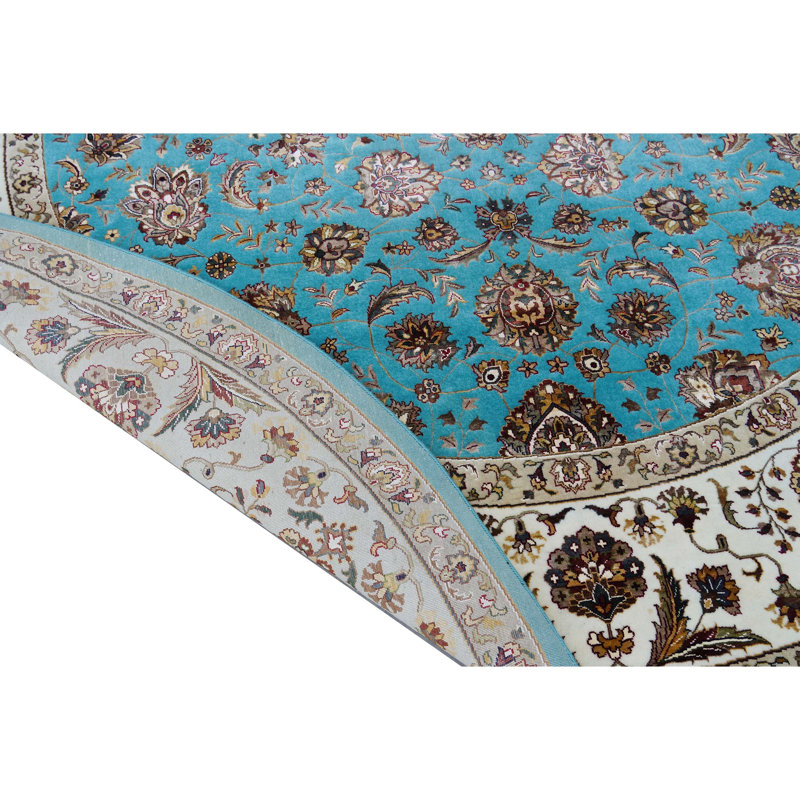 Tapis turquoise et ivoire noué à la main de haute qualité