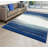 Rifiki Abstract Blue/Cream Area Rug-582808934