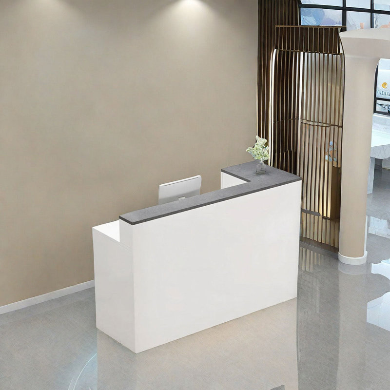 Bureau de réception en L avec plateau pour clavier, gestion des câbles et verrouillable pour salon