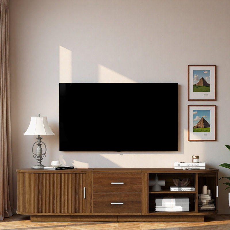 Meuble télé moderne avec tiroirs, coins arrondis, portes coulissantes, compartiments de rangement cachés et poignées élégantes