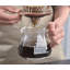Verre verseur sur une cafetière en verre résistant à la chaleur avec support pour égouttoir