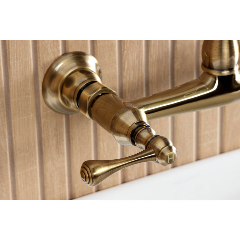 Kingston Brass English Country Two-Handle 2-Hole Wall Mount Bathroom Faucet, Antique Brass