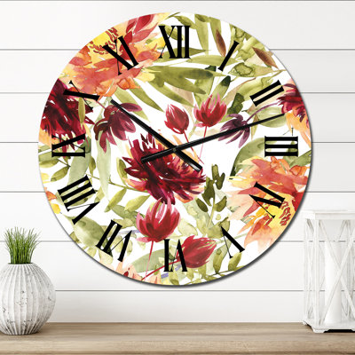 Horloge murale orange et rouge sur fond blanc
