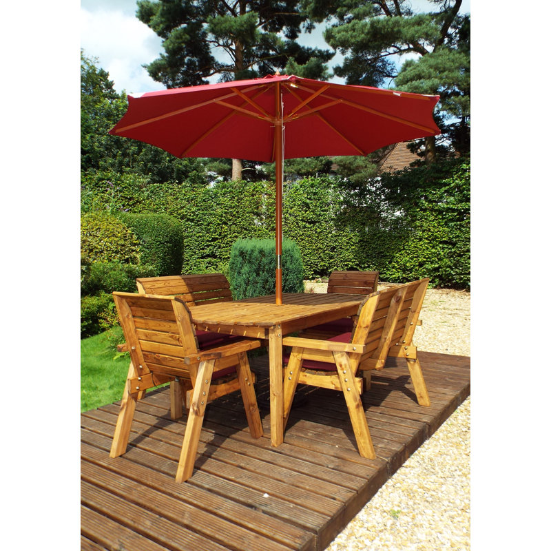 Faulk 6 - Person Wood Patio Dining Set with Rectangular Table , Cushions Included, Burgundy