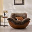 Fauteuil lounge moderne avec base en similicuir et coussin en tissu peluche, canapé bas et confortable.-322146846