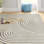Tapis gris / ivoire en polypropylène tissé à la machine Barklay