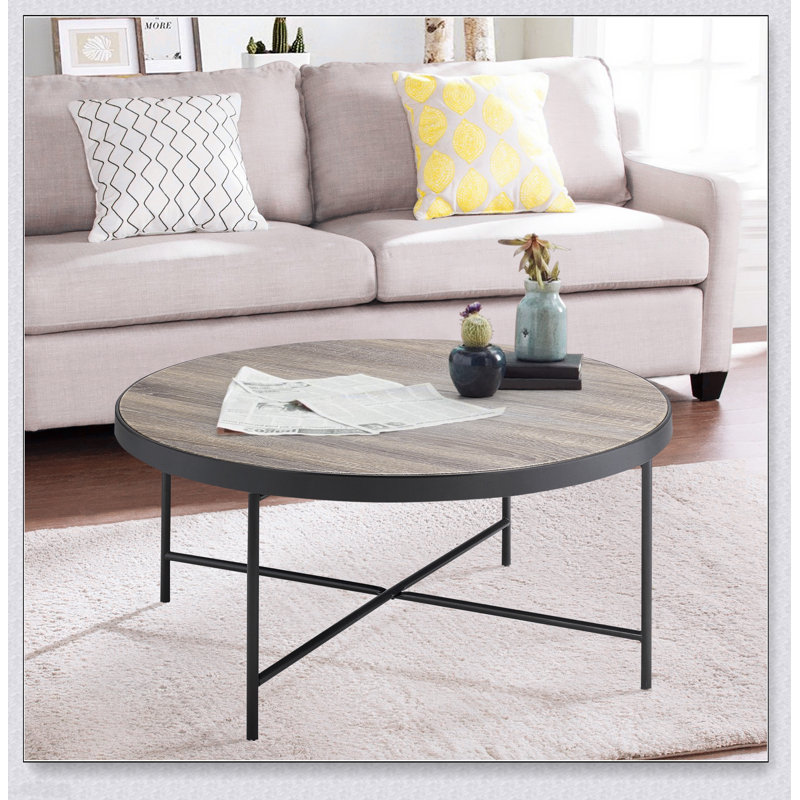 Table basse industrielle vieillie en chêne gris et métal noir patiné, durable et élégante pour les salons modernes