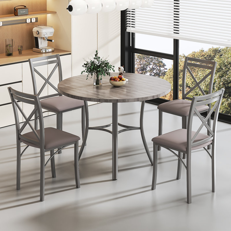 Ensemble de salle à manger à quatre pieds Kasandra pour 4 personnes, ensemble de table de salle à manger 5 pièces pour 4 personnes, table de cuisine ronde et 4 chaises de salle à manger en métal avec sièges en similicuir