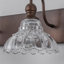 Éclairage pour meuble-lavabo texturé bronze café avec abat-jour en verre transparent-1963212879-1959730804