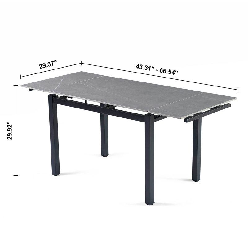 de table de salle à manger en céramique grise avec chaises en velours bleu