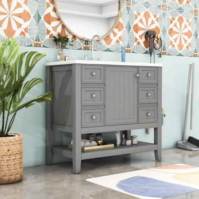 Meuble-lavabo simple en bois Volotta avec lavabo en céramique et rangement multifonctionnel