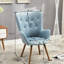Superbe fauteuil à dossier en velours jaune avec pieds en bois massif