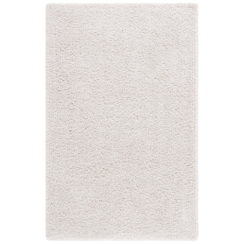 Assar Handmade Shag Ivory Rug, Rectangle 5' x 8'