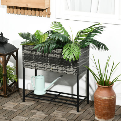 Jardinière surélevée grise, idéale pour les herbes aromatiques, les légumes et les fleurs, avec support de rangement pour outils. Style potager, gris, ludique.