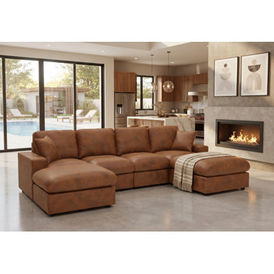 Sofa de coin Mountster avec deux poufs
