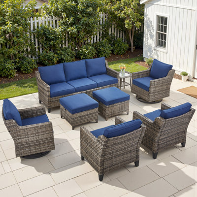 Ensemble de conversation de patio avec coussins, canapé en osier avec fauteuils pivotants, fauteuils, repose-pieds et table d'appoint Harperayne