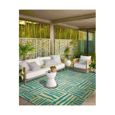 Tapis vert lavable rayé à motif thématique