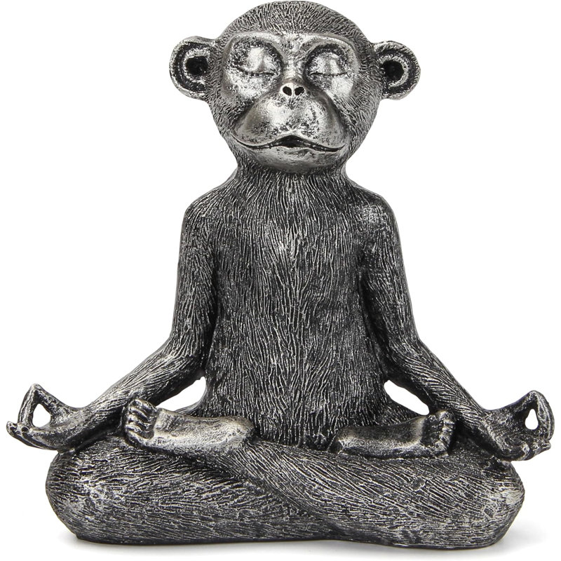 Statue de singe avec pose de yoga