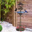 Bain d'oiseaux 3 en 1 sur pied avec mangeoire intégrée et grand bassin sous jardinière pour la décoration extérieure de votre jardin.