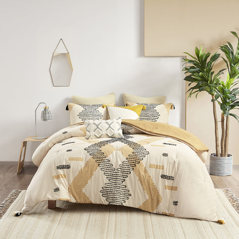 Édredon en coton, imprimé géométrique jaune avec pampilles et décor de broderie, détails de garniture à pampilles assortis