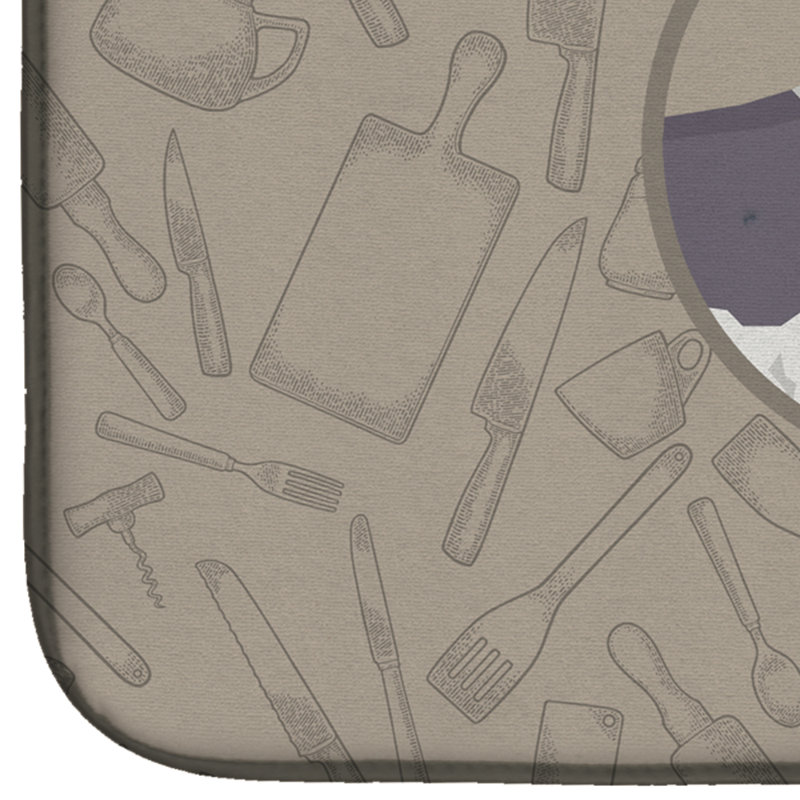 Tapis de séchage akita dans le tapis de cuisine, Lévrier