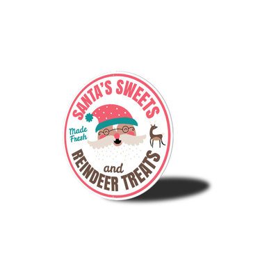 Enseigne de père Noël en bonbon et en renne