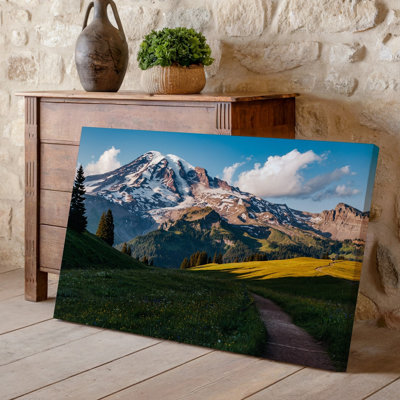 Canvas A Breathtaking Landscape Featuring A Majestic Snow Capped Mountain Rising Wall Art Dramatically Against A Clear Blue Sky Canvas Wall Art