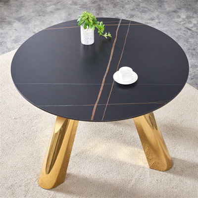 The 42-Inch Stainless Steel Gold-Plated Flamed Granite Round Table With Seating For 4 Or 6 People Is Perfect For Dining