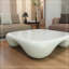 Table basse moderne en faux travertin texturé pour le salon / bureau-1262206561