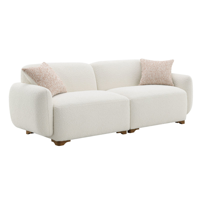 Boucle beige avec cadre intérieur robuste et sièges confortables à 2 coussins modernes