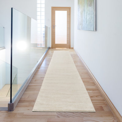 Tapis intérieur / extérieur ivoire / beige uni Mullican Sandy