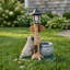 Statue de planteur de chien carlin assis