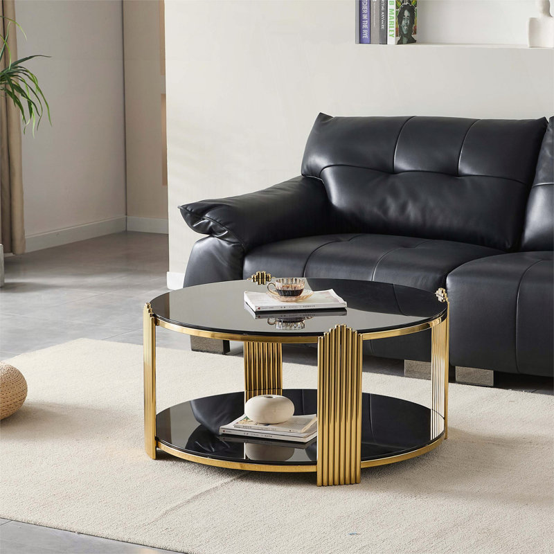Table basse ronde avec plateau en verre trempé noir et structure en acier inoxydable doré