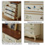 Armoire décorative en bois manufacturé brun noisette + blanc crémeux + bois manufacturé