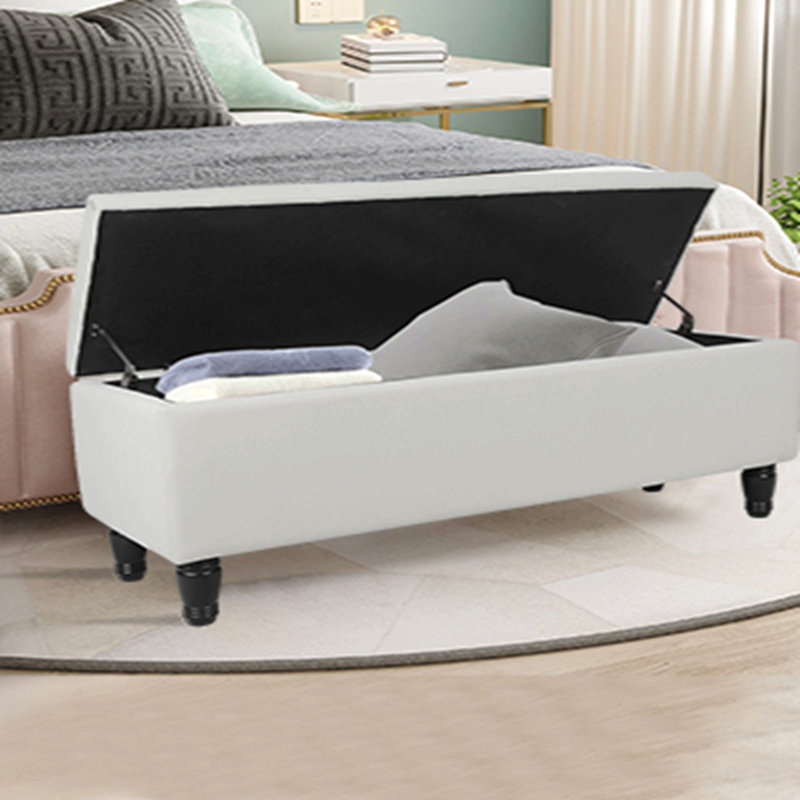 Banc de rangement avec repose-pieds en velours avec accoudoirs cloutés et pieds en bois massif de 47 po