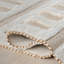 Tapis en laine à pampilles Merrick-104449777