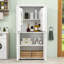 Armoire de rangement pour salle de bain avec 4 portes et tablettes réglables