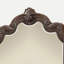 Miroir ornemental en acajou (miroir seulement)