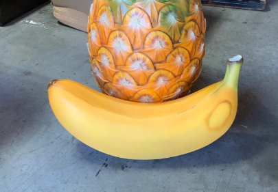 Banana Laying Over Sized Statue