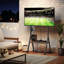 Meuble télé mobile à roulettes avec station de charge, support pour télé mobile avec tablette de rangement