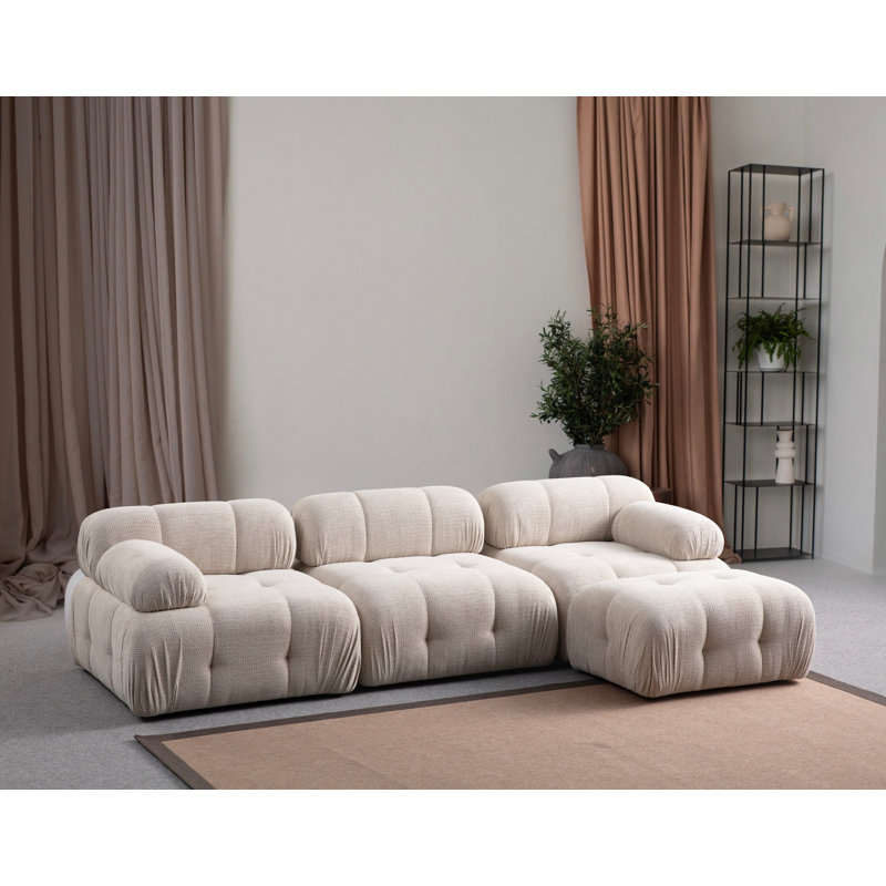 Élégant canapé d'angle | Structure en bois de hêtre durable et en carton, tissu 100% polyester | Support pour le dos en mousse et en silicone gris doux | Design moderne avec pieds en plastique noir | Parfait pour les salons et les salons