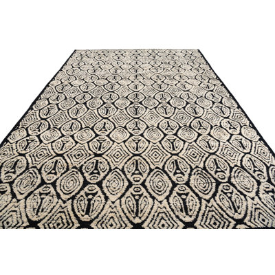 Iniguez Black Rug