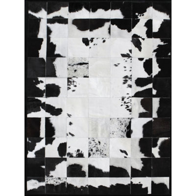 Rompecabeza Cowhide Abstract Area Rug