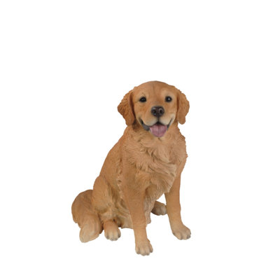 Statue golden retriever assis
