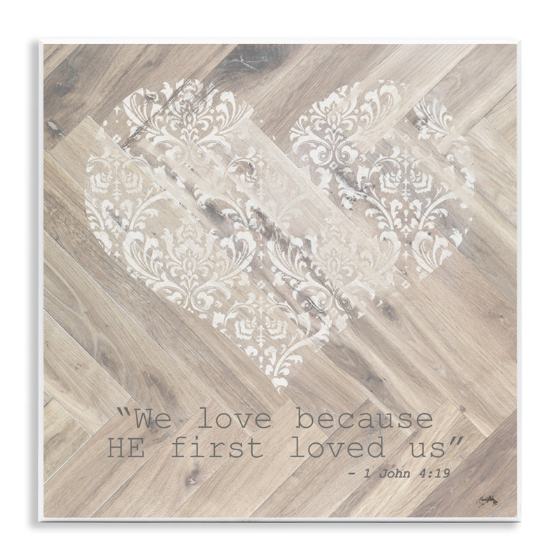 «He Love Us First», plaque murale par Elizabeth Medley