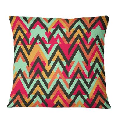 Coussin décoratif à motif zigzag en rouge et bleu