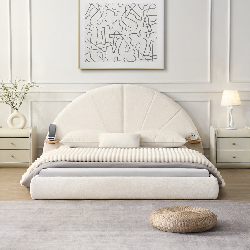 Lit arqué unique avec petite table, combinant esthétique moderne et design fonctionnel pour une vie confortable